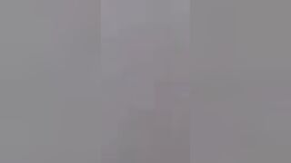 Cameraman catches Asian lady satisfying her cunts need