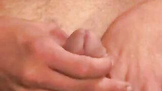 Mature guy flaunts his big hard cock before stroking it