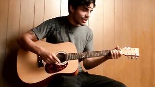 Handsome guy plays guitar while jerking off alone