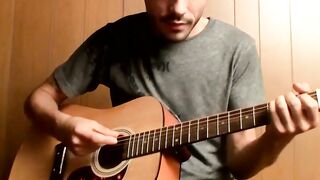 Handsome guy plays guitar while jerking off alone