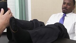 Black foot lover sighs as soles get licked clean