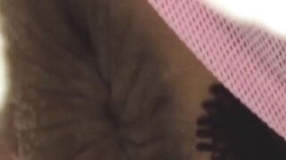 Hidden cam catches Japanese babe pulling thong up ass