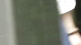 Hidden cam catches Japanese babe pulling thong up ass