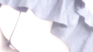 Hidden cam catches Japanese babe pulling thong up ass