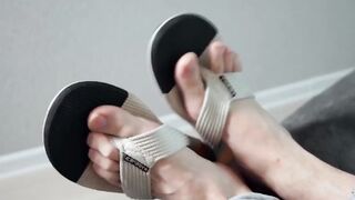 Cute hunk Aleck fists meat while baring his massive feet size