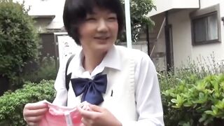 Tiny Asian student flashes her wet panties to the filming man