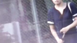 Japanese girls nabbed by lusty peeper urinating out in open