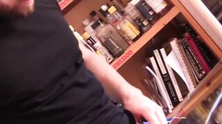 Bearded John Powers spills milky cum across the table