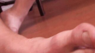 Bearded John Powers spills milky cum across the table