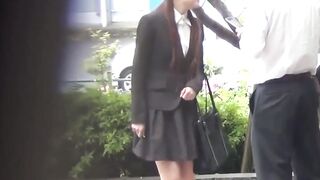 Japanese lady lets piss flow out while still in a skirt