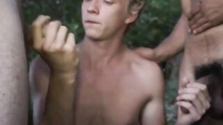 Young guy sucks off three hunks during wild forest encounter