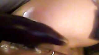 Filling Her Back Door with a Huge Dildo
