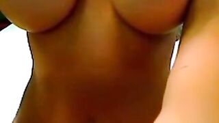 Big-Titted Brunette Rides Vibrator On Webcam