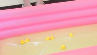 Full bladder girls invited to fill the pool with golden flows
