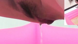 Pungent piss pool deepens with each girls added warm stream