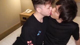 Jeff stretches Tomokis Asian twink hole before mutual handjob