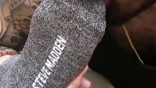 Bearded pro expertly licks toes through fabric