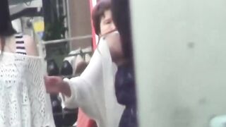 Pair of young Japanese women rush stall to share pee relief