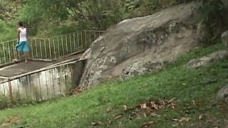 Young Latinos rough pound each other in nature