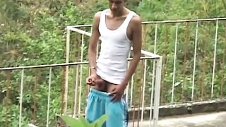 Young Latinos rough pound each other in nature