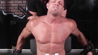 Mulengro traps Tyler Saint in a chair with electro lit abs