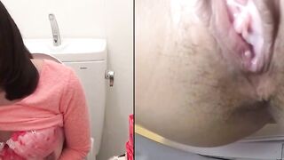 Asian gal pauses shopping to finger herself to squirt