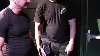 Tyler Saint roped to table with cock clamped by heavy weight
