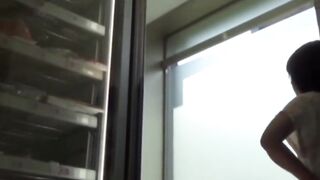 Camera watches Japanese ladies pee in a cramped restroom