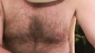 Hairy chested mature lad jerks his thick erection