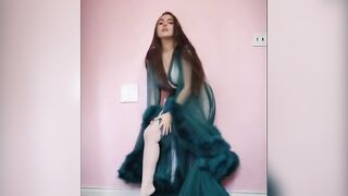 Busty Brunette's Sensual Striptease in BDSM-themed Lingerie