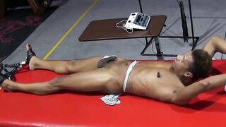 Captive RT tied on table legs up and he loves it