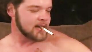 Tattooed stud relaxes before jerking to cumshot