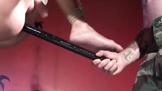 Ricky Saint inserts baton into Derek Pains tight muscle hole