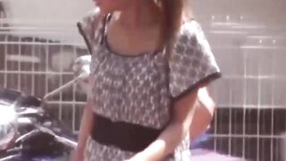 Peeping lens grabs Asian vixen peeing next to her vehicle
