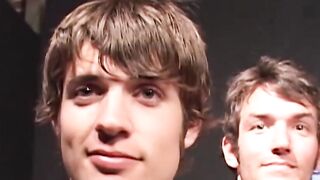 Handsome guys kneel behind cover to service thick shafts