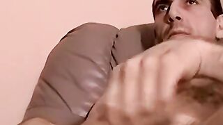 Bald jock strokes dick to porn till cumming hard