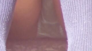 Athletic Japanese girl filmed during play in short skirt