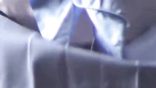 Athletic Japanese girl filmed during play in short skirt