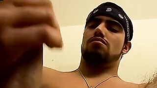 Badass straight stares at cam while pumping cock