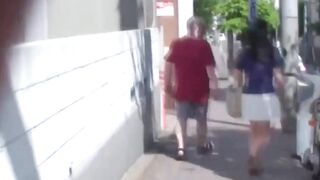 Tall Asian babe tailed by voyeur cam every step