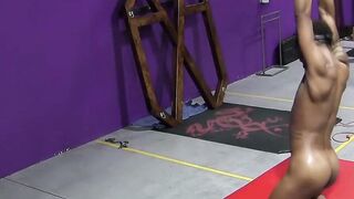 Captive RT screams as flogger lashes his naked thighs