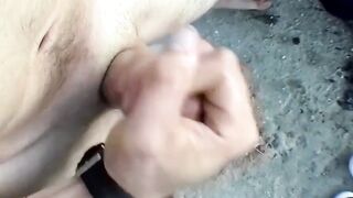 Muscular Elijah Knight jerks fat cock outside