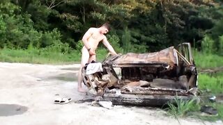 Muscular Elijah Knight jerks fat cock outside