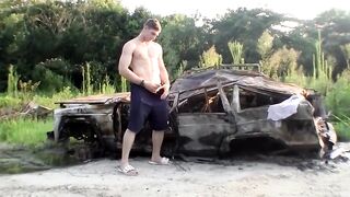 Muscular Elijah Knight jerks fat cock outside