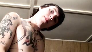 Skinny inked thug teases his hairy stiff shaft