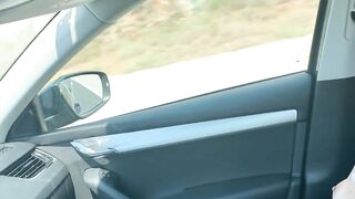 Big-Titted Brunette Sucks Driver's Cock in Car for a Mouthful of Cum