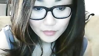 Asian Webcam Slut Strips and Rubs Her Pussy
