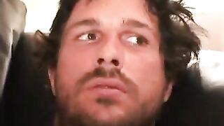 Inked thug rubs hairy cock before blasting cum