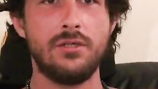 Inked thug rubs hairy cock before blasting cum