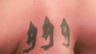 Inked thug rubs hairy cock before blasting cum